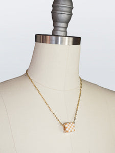 checkered dice necklace