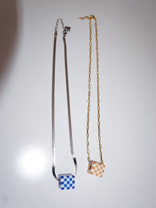 checkered dice necklace
